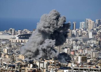 An explosion from an Israeli airstrike on a building sends thick smoke into the sky in Dahiyeh, southern Beirut. (AP pic)