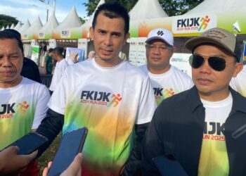 Pelaksana Tugas Direktur Utama Bank Aceh, M Hendra Supardi, saat meninjau layanan digital di arena FKIJK Run 2025, Ahad, 11 Mei 2025.