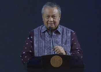 Gubernur Bank Indonesia (BI) Perry Warjiyo saat menyampaikan sambutan dalam acara Pertemuan Tahunan Bank Indonesia (PTBI) Tahun 2025 di Grha Bhasvara Icchana, kompleks kantor pusat Bank Indonesia, Jakarta, Jumat (28/11/2025) malam. (Tangkapan Layar Youtube/Bank Indonesia)
