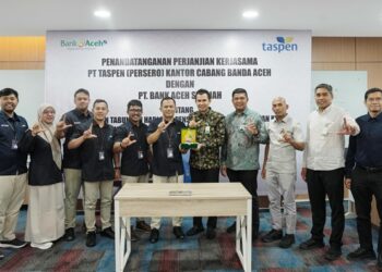 PT Bank Aceh Syariah bersama PT Taspen (Persero) menjalin kerja sama layanan pembayaran Tabungan Hari Tua, Pensiun, Jaminan Kecelakaan Kerja, dan Jaminan Kematian melalui rekening bank di Banda Aceh, Selasa (5/5/2026). FOTO/Humas