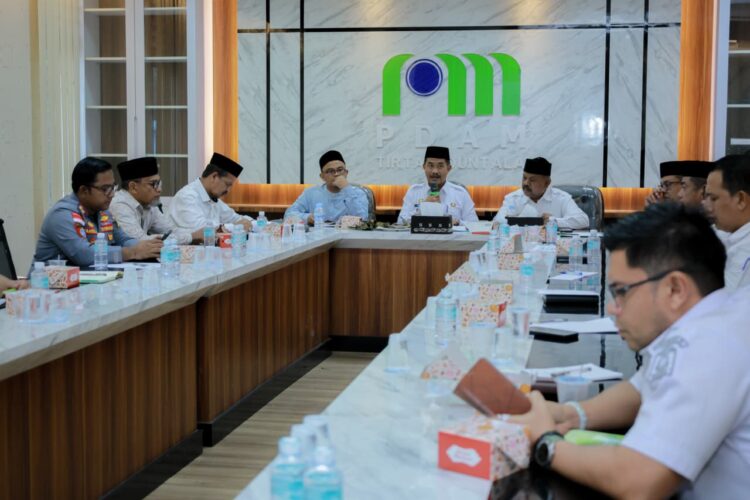 Wakil Bupati Aceh Besar Drs Syukri A Jalil memimpin rapat persiapan pelaksanaan MTQ Kabupaten Aceh Besar keXXXV Tahun 2026 dengan tuan rumah Kecamatan Kuta Baro di Aula PDAM Tirta Mountala Rabu 1282026 FOTO MC ACEH BESAR KETIKKABARcom Wakil Bupati Aceh Besar Drs Syukri A Jalil memimpin rapat persiapan pelaksanaan MTQ Kabupaten Aceh Besar ke XXXV Tahun 2026 dengan tuan rumah Kecamatan Kuta Baro di Aula PDAM Tirta Mountala Rabu 1282026 FOTO MC ACEH BESAR