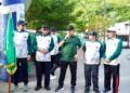 Asisten I Sekdakab Aceh Besar Farhan AP menyampaikan sambutan pada pelepasan jalan santai Milad ke 17 Mahad Daarut Tahfizh Al Ikhlas di Komplek Vila Buana Darul Imarah Minggu 2792026 FOTO MC ACEH BESAR