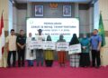 Penyaluran zakat dan infaq Masa Haul 2025 Tahun Anggaran 2026 secara non tunai kepada ribuan penerima manfaat termasuk bantuan pembangunan 30 unit rumah di Aula Pulau Weh Kantor Wali Kota Sabang