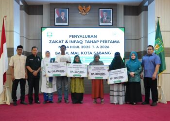 Penyaluran zakat dan infaq Masa Haul 2025 Tahun Anggaran 2026 secara non tunai kepada ribuan penerima manfaat termasuk bantuan pembangunan 30 unit rumah di Aula Pulau Weh Kantor Wali Kota Sabang